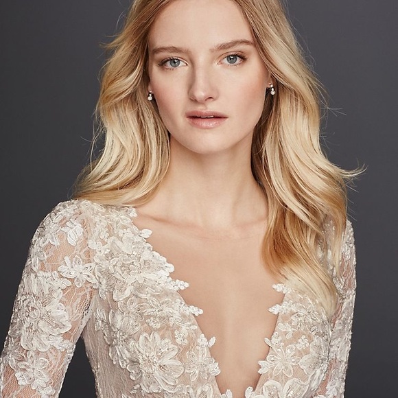 Petite long sleeve plunging v-neckline ivory lace wedding gown